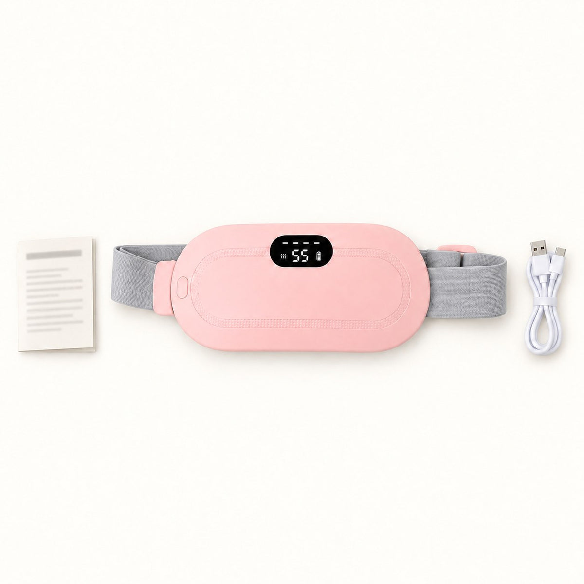 Contenu de la boîte CHALYNE rose : ceinture chauffante, câble de charge USB-C et notice